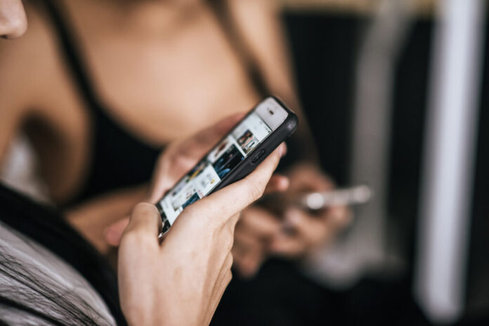 Women Touch And Chating with smart phone